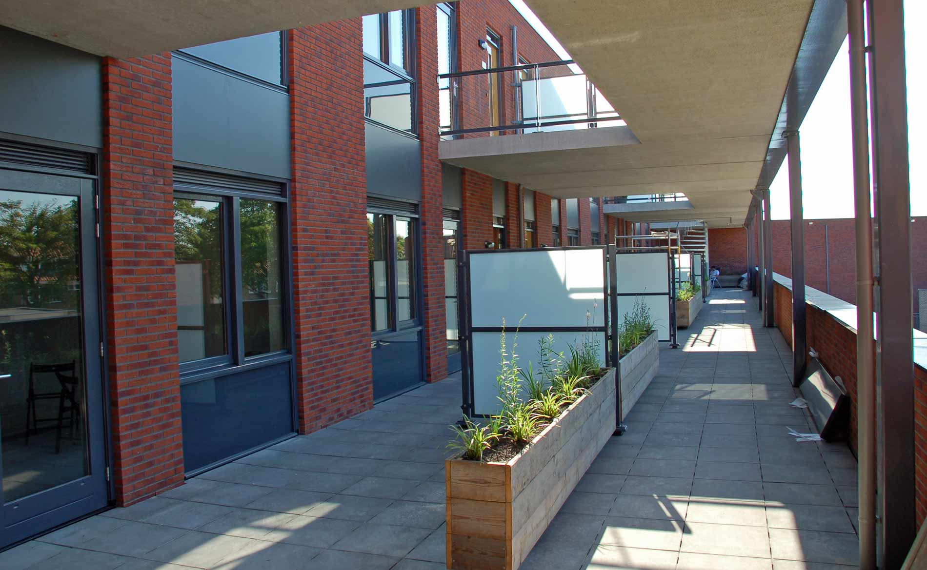 brede school architect BREEAM peuterspeelzaal bso appartementen Paulusschool Castricum BBHD architecten